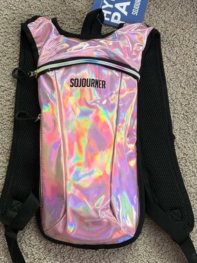 Sojourner Rave 2 Liter Hydration Pack Backpack in Holographic Pink